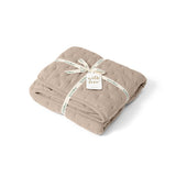 Little Green Sheep Organic Dimple Quilt in Truffle