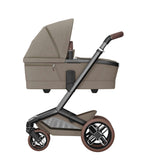 Maxi-Cosi Fame Pushchair + Carrycot - Twillic Truffle with Brown Wheels 1